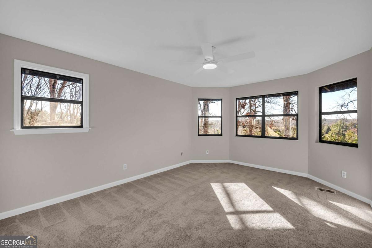 2975 Highway 72 Comer, GA 30629 - Photo 33 of 42 an empty room with windows