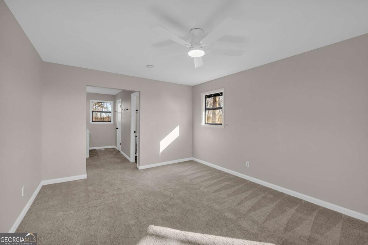 2975 Highway 72 Comer, GA 30629 - Photo 34 of 42 an empty room with windows