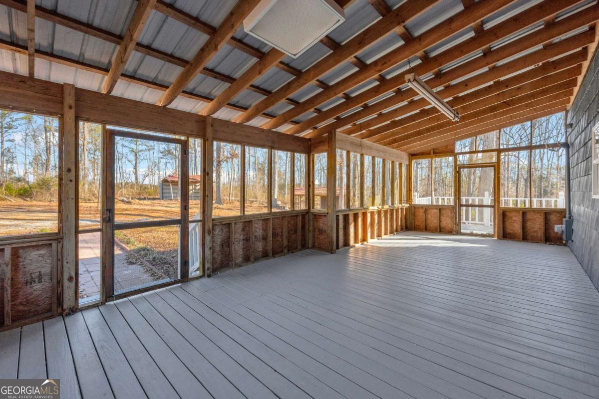 2975 Highway 72 Comer, GA 30629 - Photo 5 of 42 a view of empty room with wooden floor