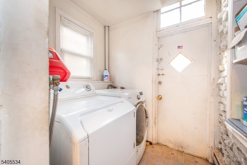 448 East 31st Street Paterson, NJ 07504 - Photo 10 of 23 a utility room with dryer and washer