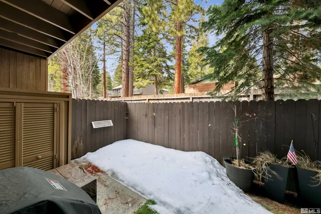 a bedroom with a bed and a closet