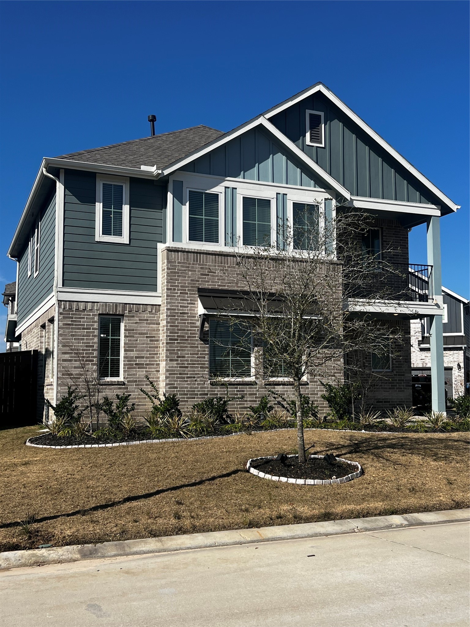 7743 Swooping Swallow Lane Katy, TX 77493 - Photo 1 of 45 a front view of a house with a yard
