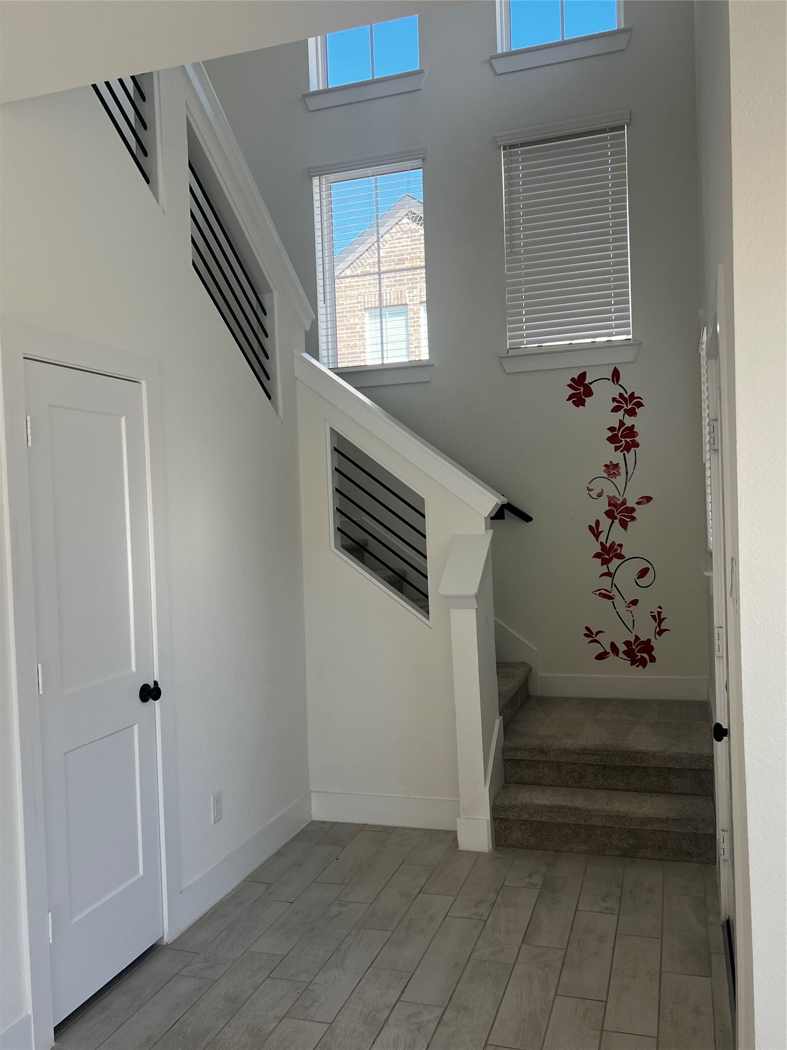 7743 Swooping Swallow Lane Katy, TX 77493 - Photo 23 of 45 a view of entryway with wooden floor and stairs