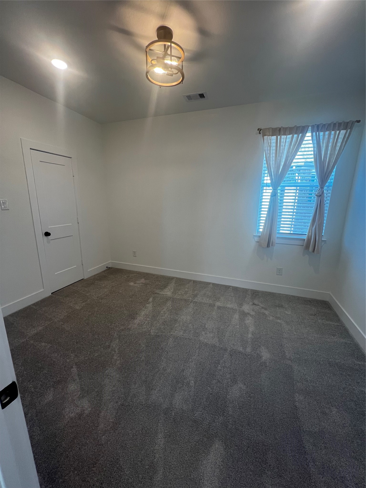 7743 Swooping Swallow Lane Katy, TX 77493 - Photo 29 of 45 an empty room with windows