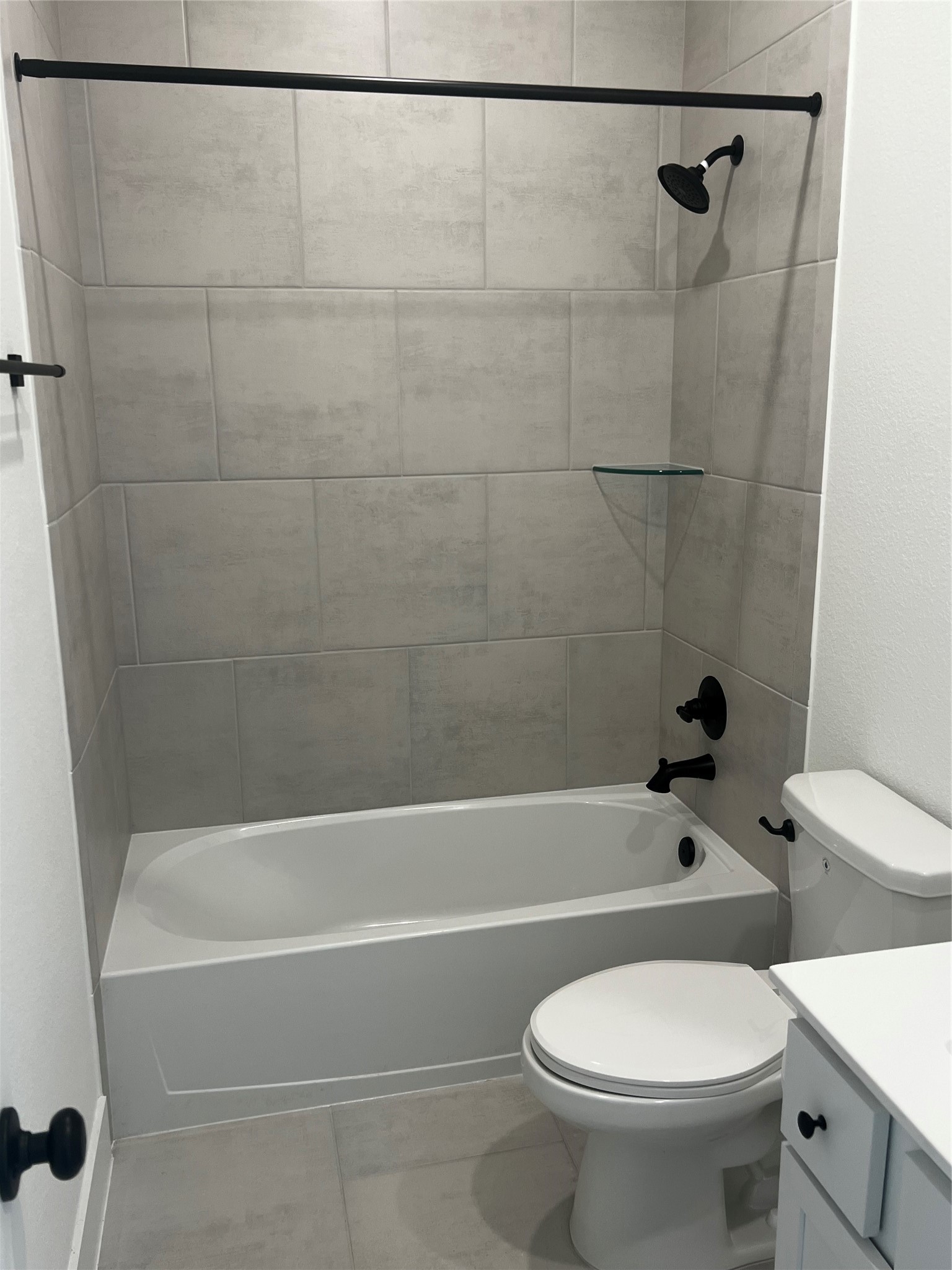 7743 Swooping Swallow Lane Katy, TX 77493 - Photo 40 of 45 a bathroom with a toilet and a shower