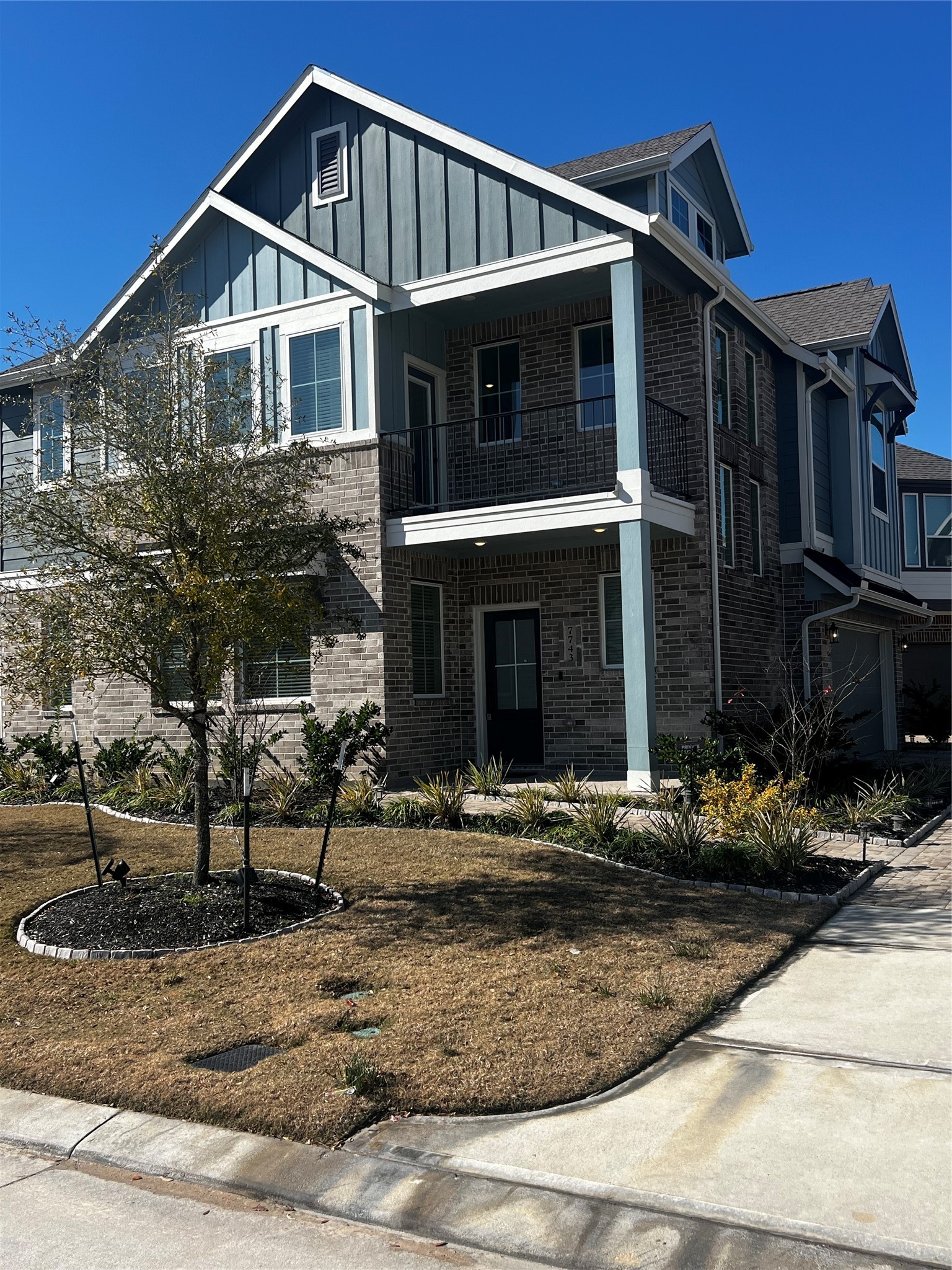7743 Swooping Swallow Lane Katy, TX 77493 - Photo 4 of 45 a front view of a house with entertaining space