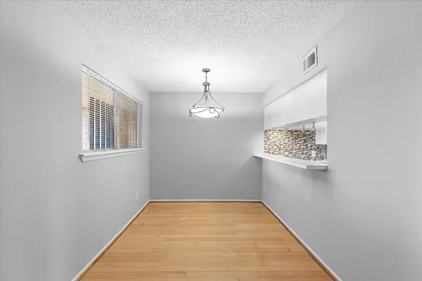 a view of a hallway with entryway