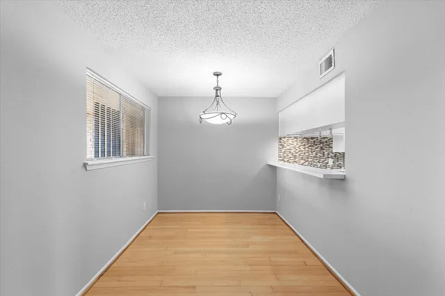 a view of a hallway with entryway