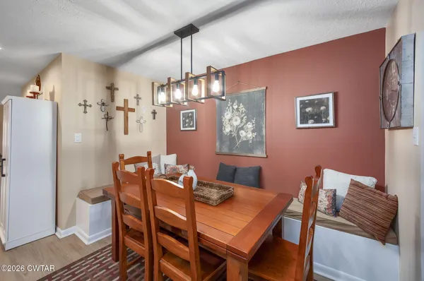 a view of a dining room with furniture
