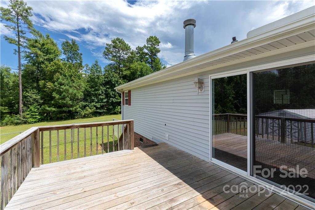 712 Hall Spencer Road Catawba, SC 29704 - Photo 27 of 32 a view of two chairs on the roof deck