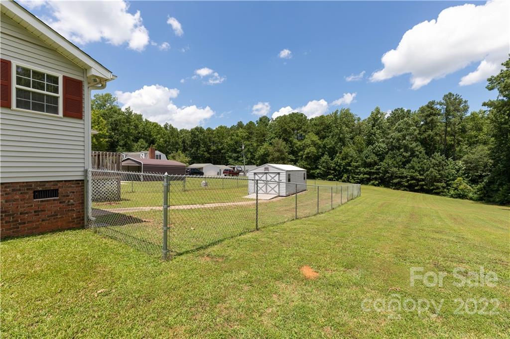 712 Hall Spencer Road Catawba, SC 29704 - Photo 4 of 32 a view of a backyard