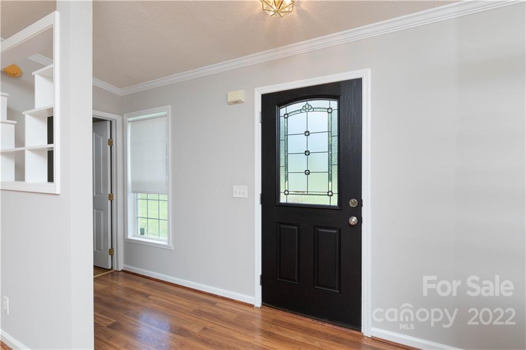 712 Hall Spencer Road Catawba, SC 29704 - Photo 6 of 32 an empty room that has a window in it