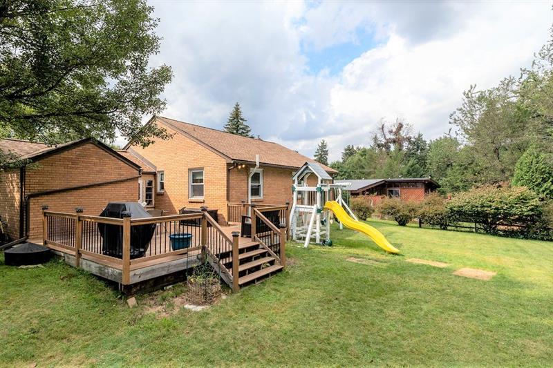 222 Goldsmith Road Pittsburgh, PA 15237 - Photo 22 of 25 Expansive Deck Overlooks Backyard - Playset Included