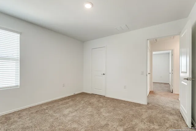 an empty room with a natural light