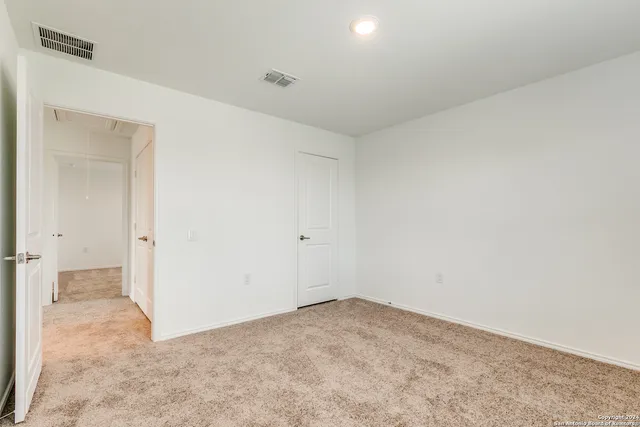an empty room with an entryway