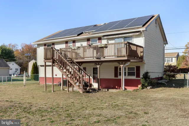 a view of house with outdoor space and entertaining space