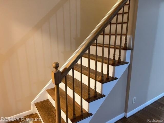 1133 Braeview Drive Howell, MI 48843 - Photo 6 of 14 Front Door Entry to the Living Room with Stairs to upper level