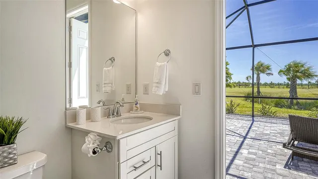 a view of a swimming pool and an outdoor space