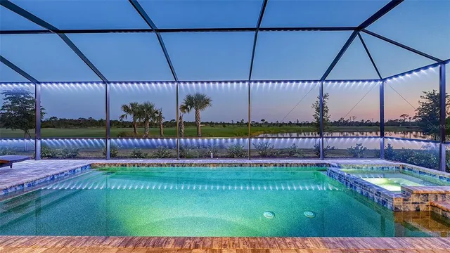 a bedroom with a bed and a sink