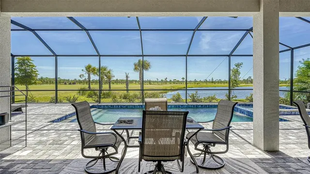 a dining room with furniture window wooden floor