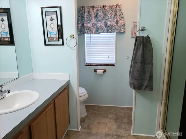 a bathroom with a sink and a toilet