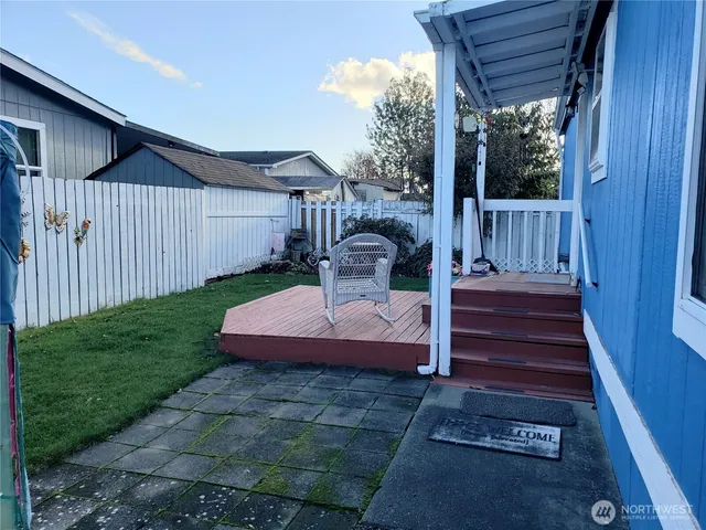 a view of a sink and a table in a room