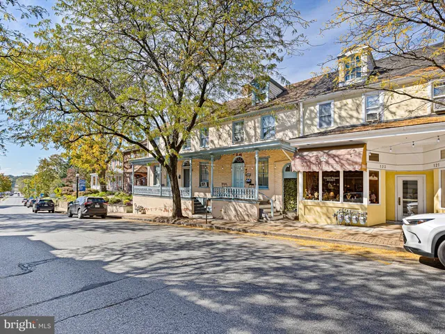a front view of a building with street view