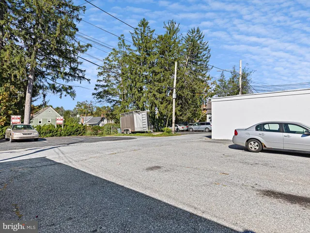 front view of a house with a street