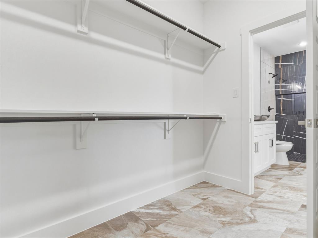 1412 Ridgeview Circle Granbury, TX 76048 - Photo 12 of 20 a view of a walk in closet