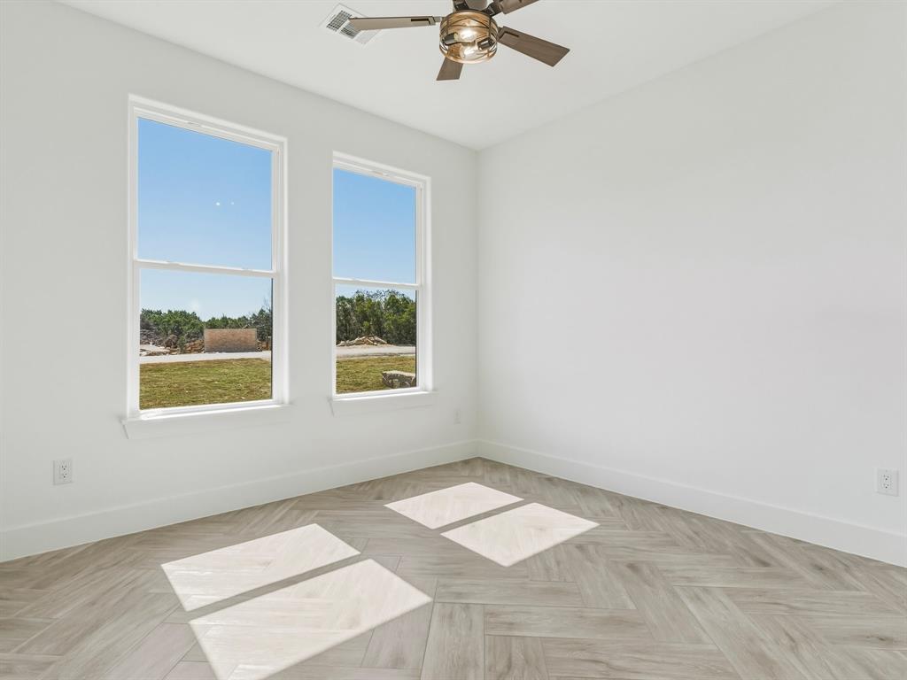 1412 Ridgeview Circle Granbury, TX 76048 - Photo 14 of 20 an empty room with a window