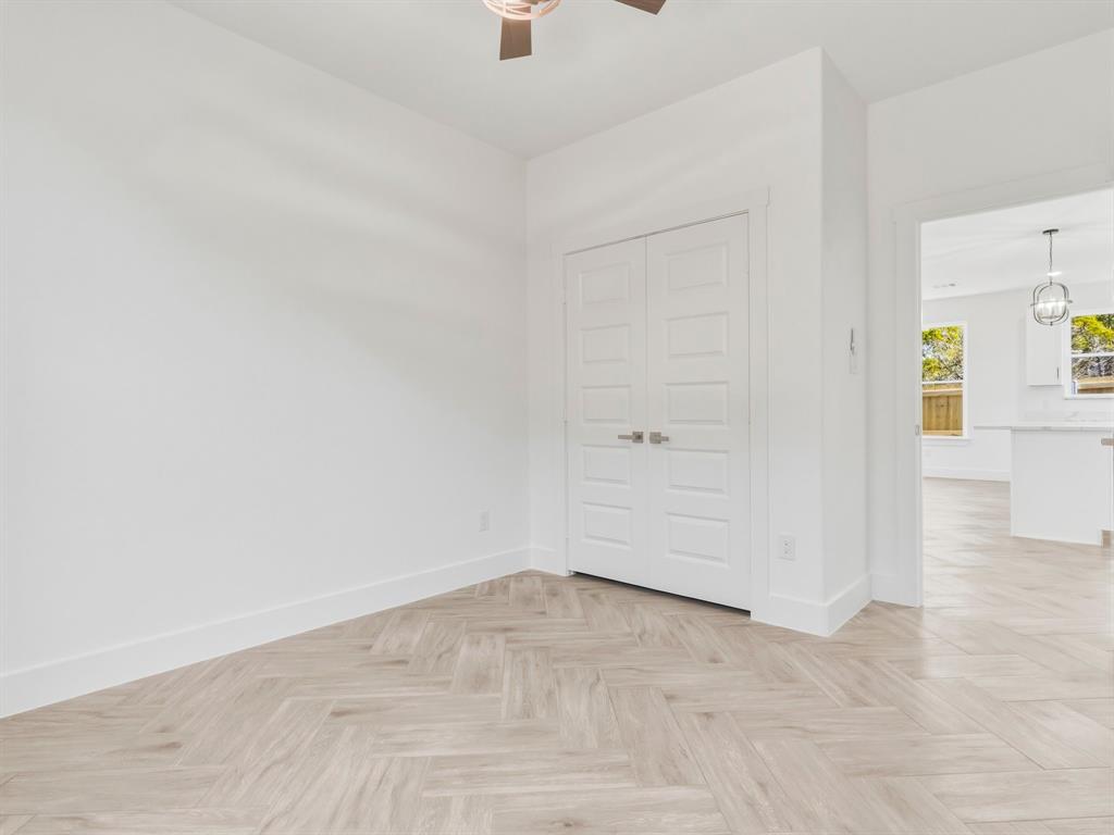 1412 Ridgeview Circle Granbury, TX 76048 - Photo 17 of 20 wooden floor in a empty room