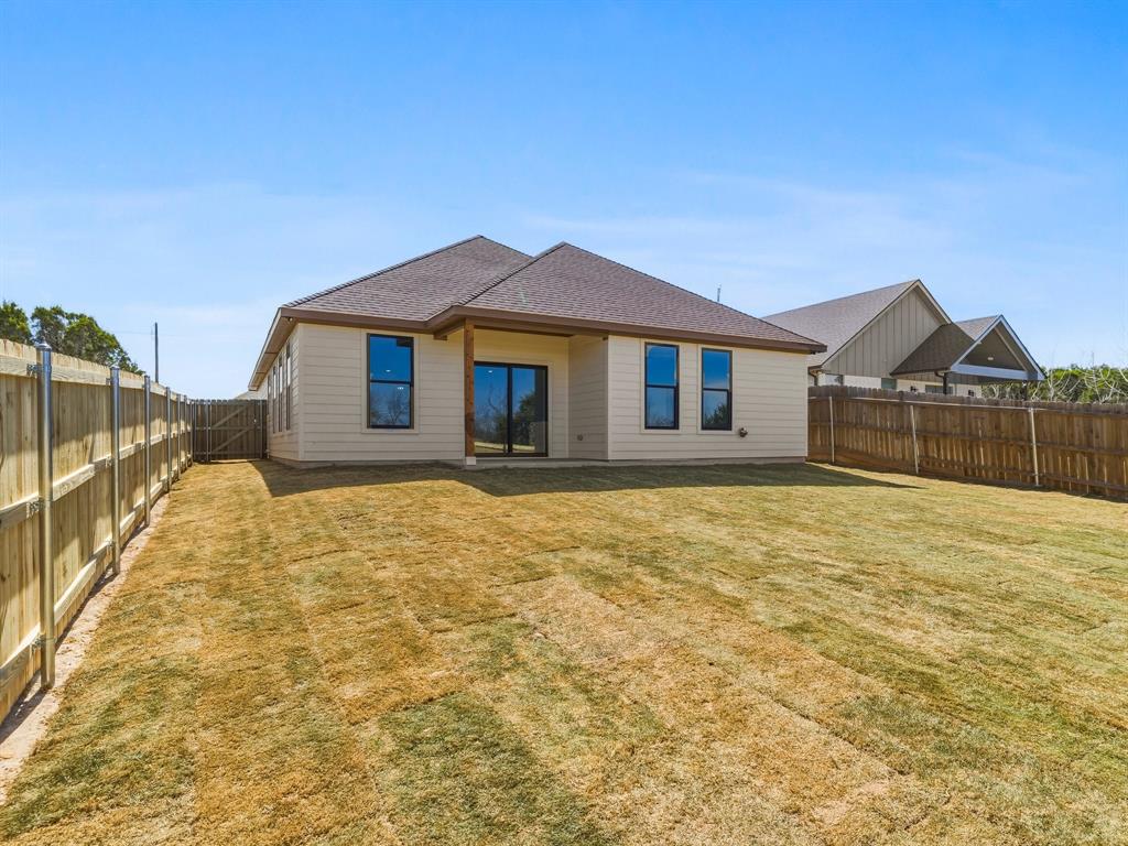 1412 Ridgeview Circle Granbury, TX 76048 - Photo 20 of 20 a front view of a house with a yard