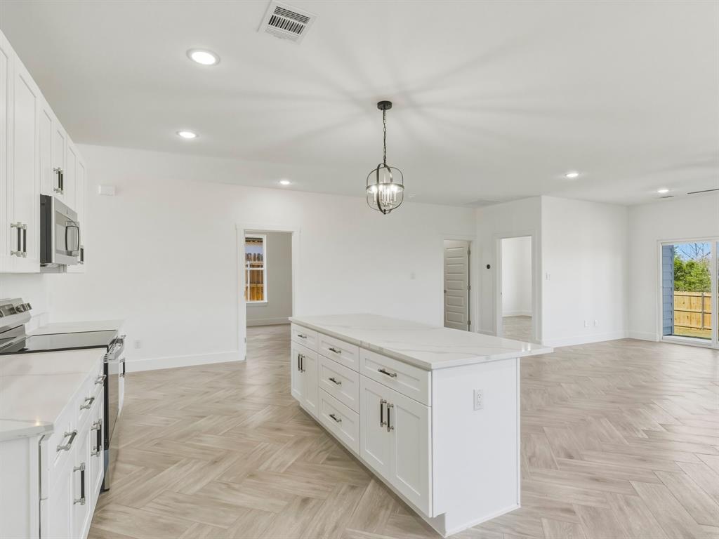 1412 Ridgeview Circle Granbury, TX 76048 - Photo 5 of 20 a spacious bathroom with a granite countertop sink a mirror and shower