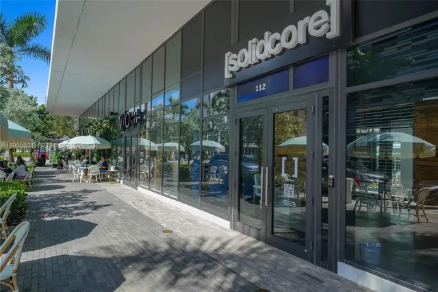 a view of path along with retail shop and windows