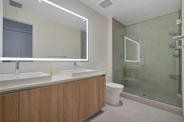 a bathroom with a sink and a toilet