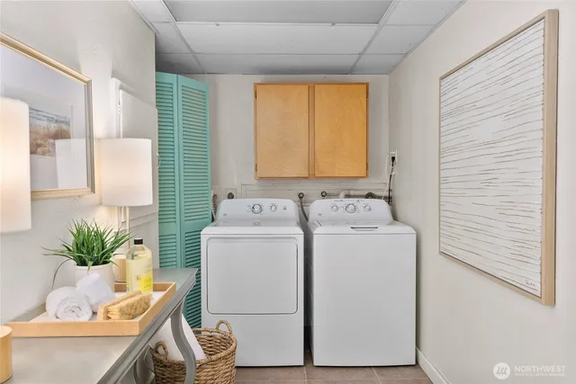 a utility room with dryer and washer