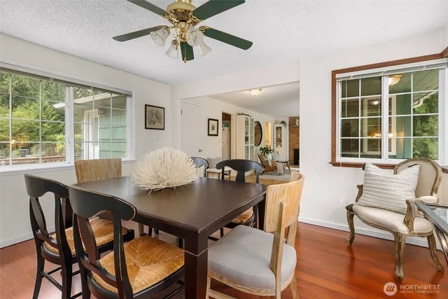 a view of a dining room with furniture window and outside view