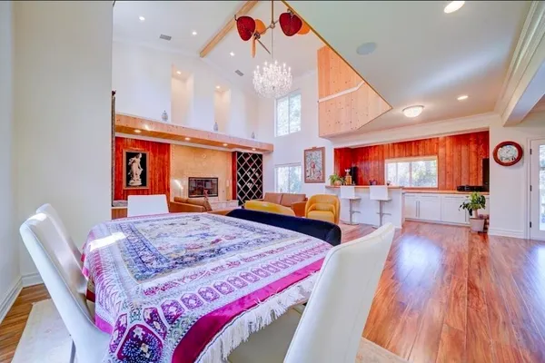 a view of a kitchen and dining room