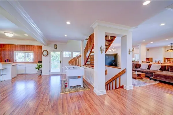 a kitchen with stainless steel appliances a sink a stove and a refrigerator