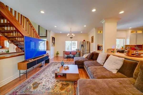 a living room with furniture and a table