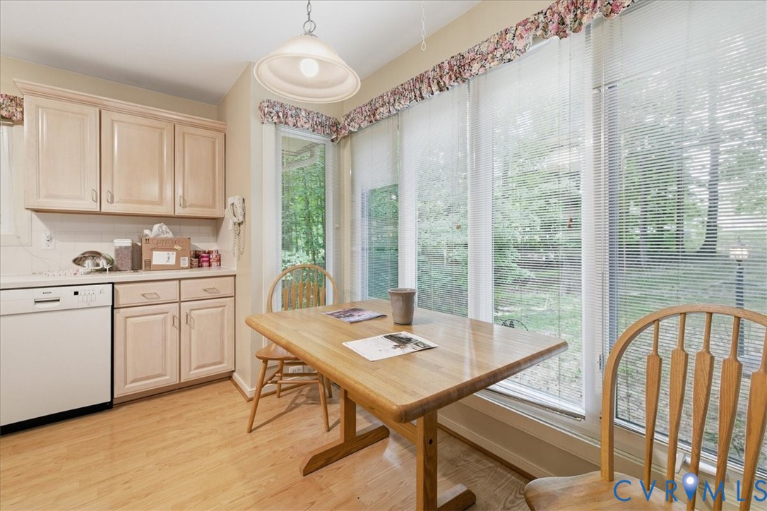 4099 Doe Run Road Hopewell, VA 23860 - Photo 5 of 36 Eat-in kitchen featuring wood-finish flooring, woo