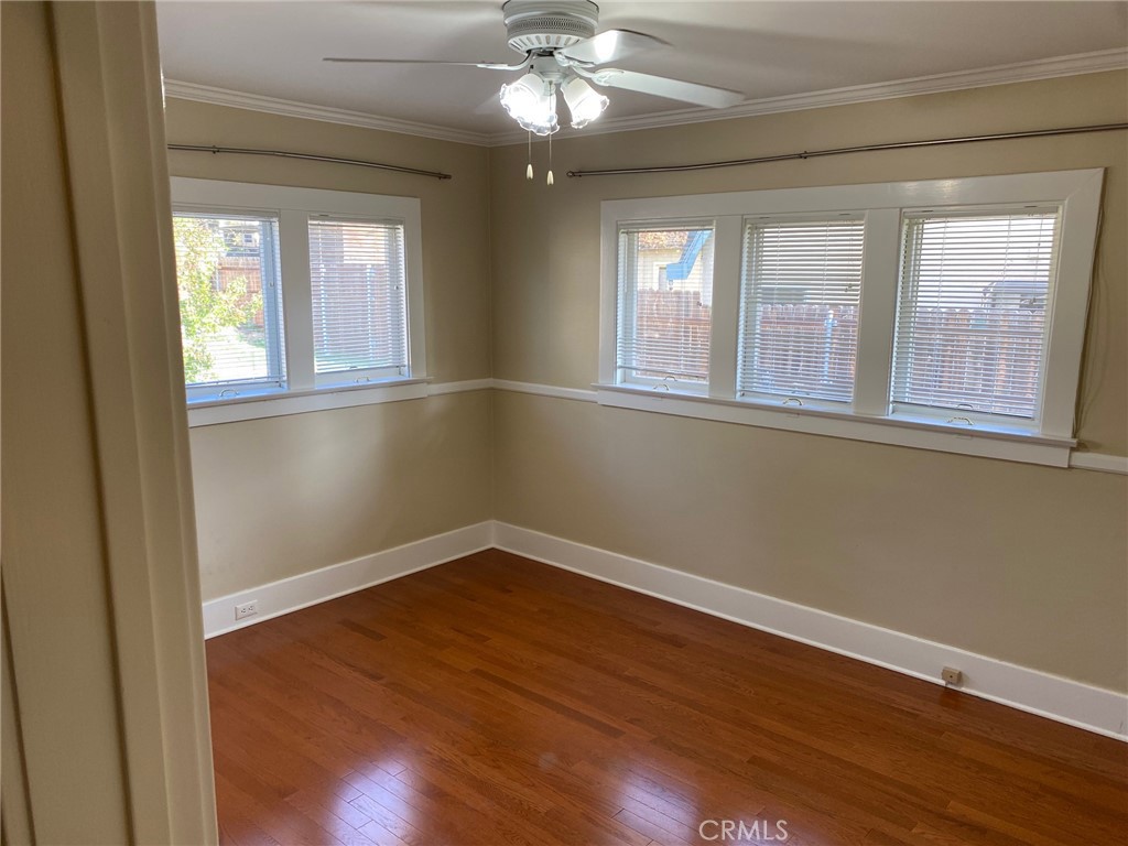 491 Eldora Road Pasadena, CA 91104 - Photo 12 of 14 a view of an empty room with wooden floor and a window
