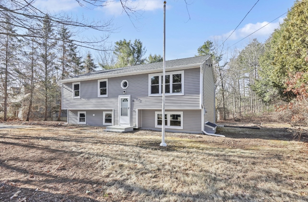 33 Brimfield Road Holland, MA 01521 - Photo 2 of 27 a front view of a house with a porch
