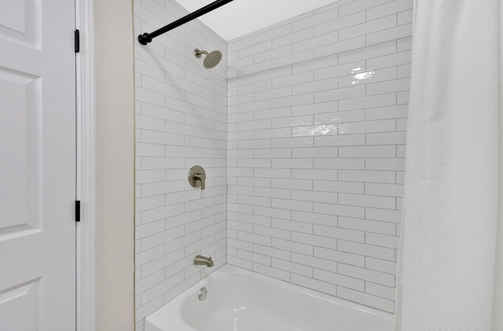 33 Brimfield Road Holland, MA 01521 - Photo 21 of 27 a bathroom with a bathtub