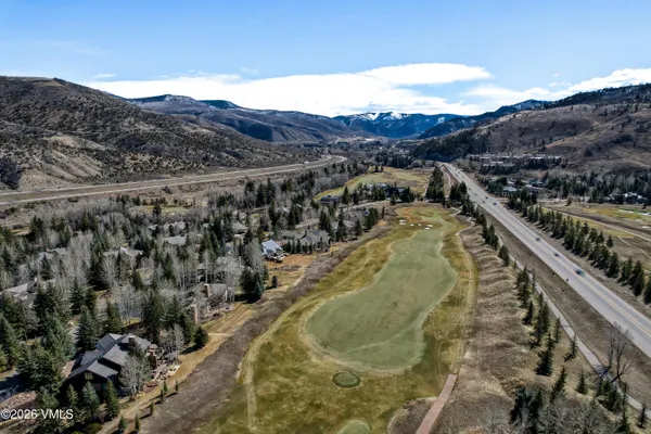 a view of a swimming pool with a lake