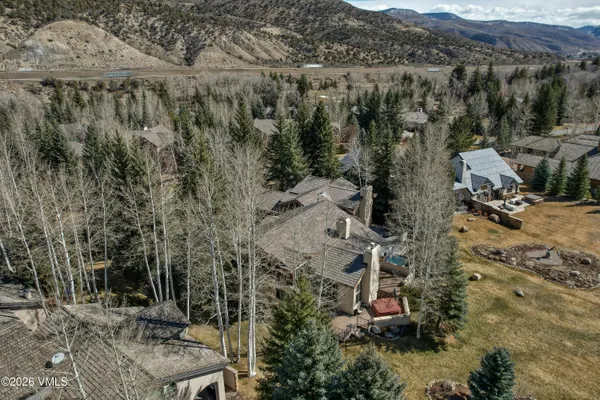 an aerial view of residential house with outdoor space