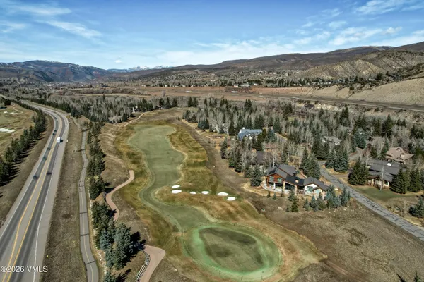 a view of a city with mountains