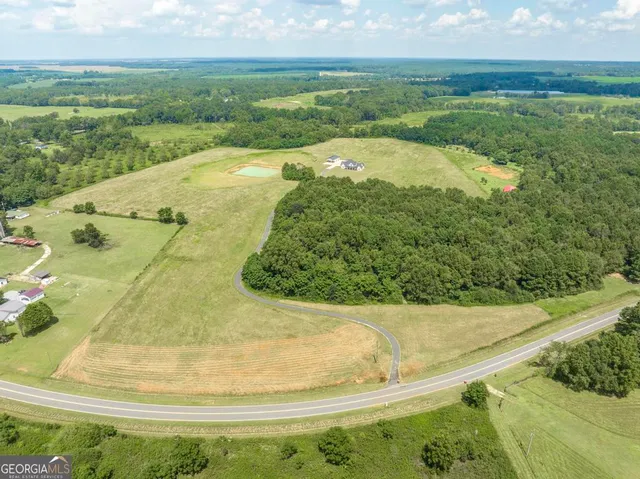 a view of a lake with a beach