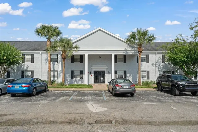 a car parked in front of a house