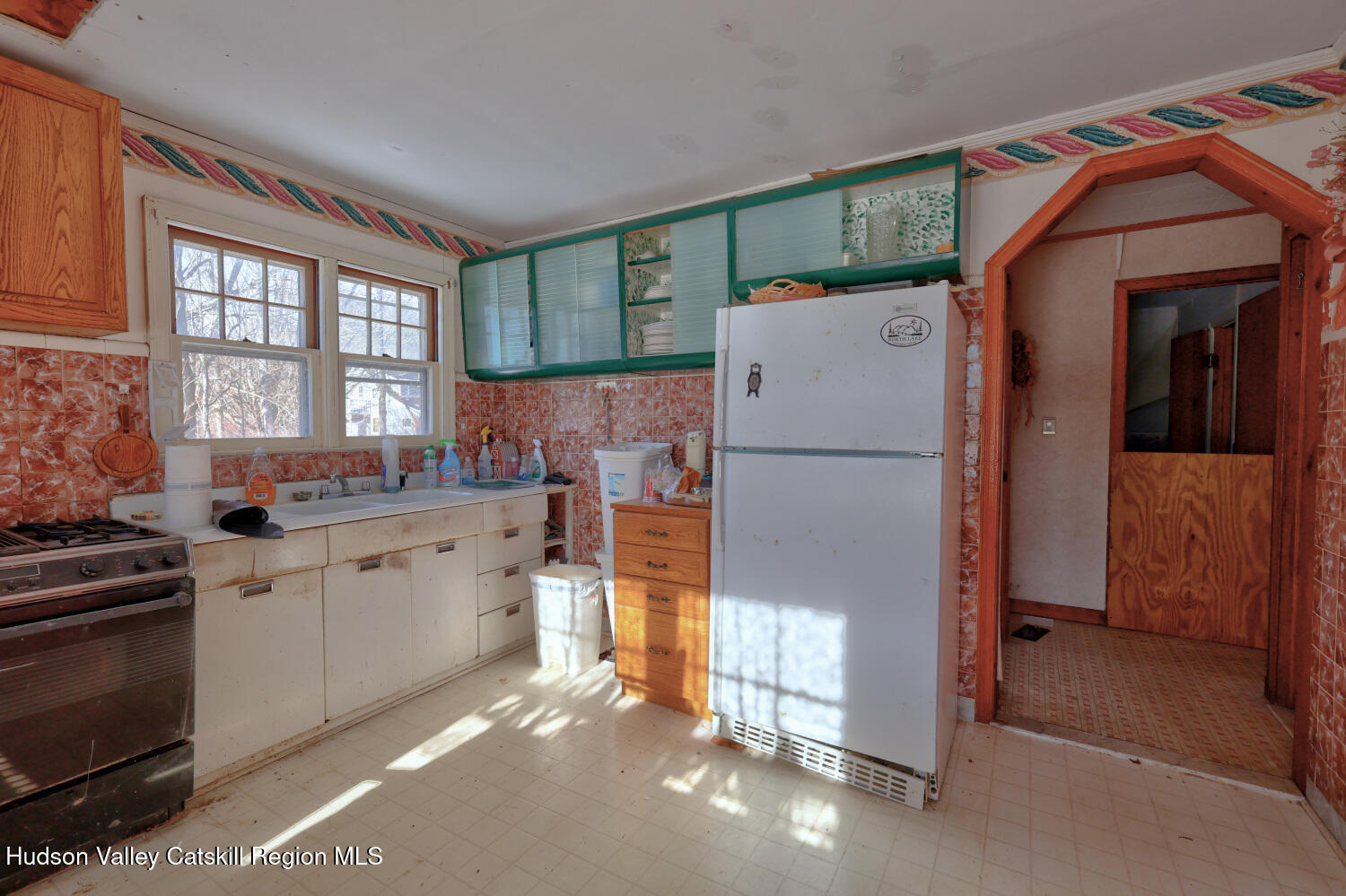 42 Old Rte 23 Cairo, NY 12413 - Photo 29 of 69 a kitchen with a refrigerator and a sink